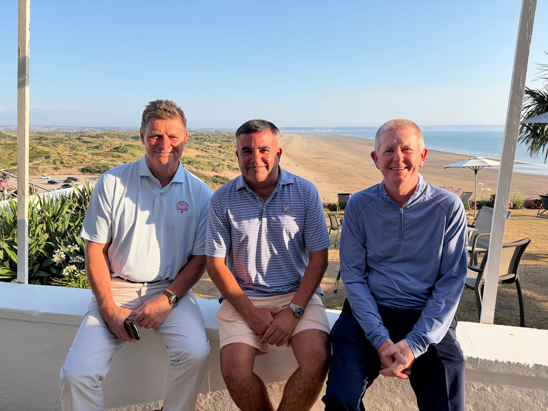 Delegates on the terrace at Saunton Sands Hotel overlooking the beach