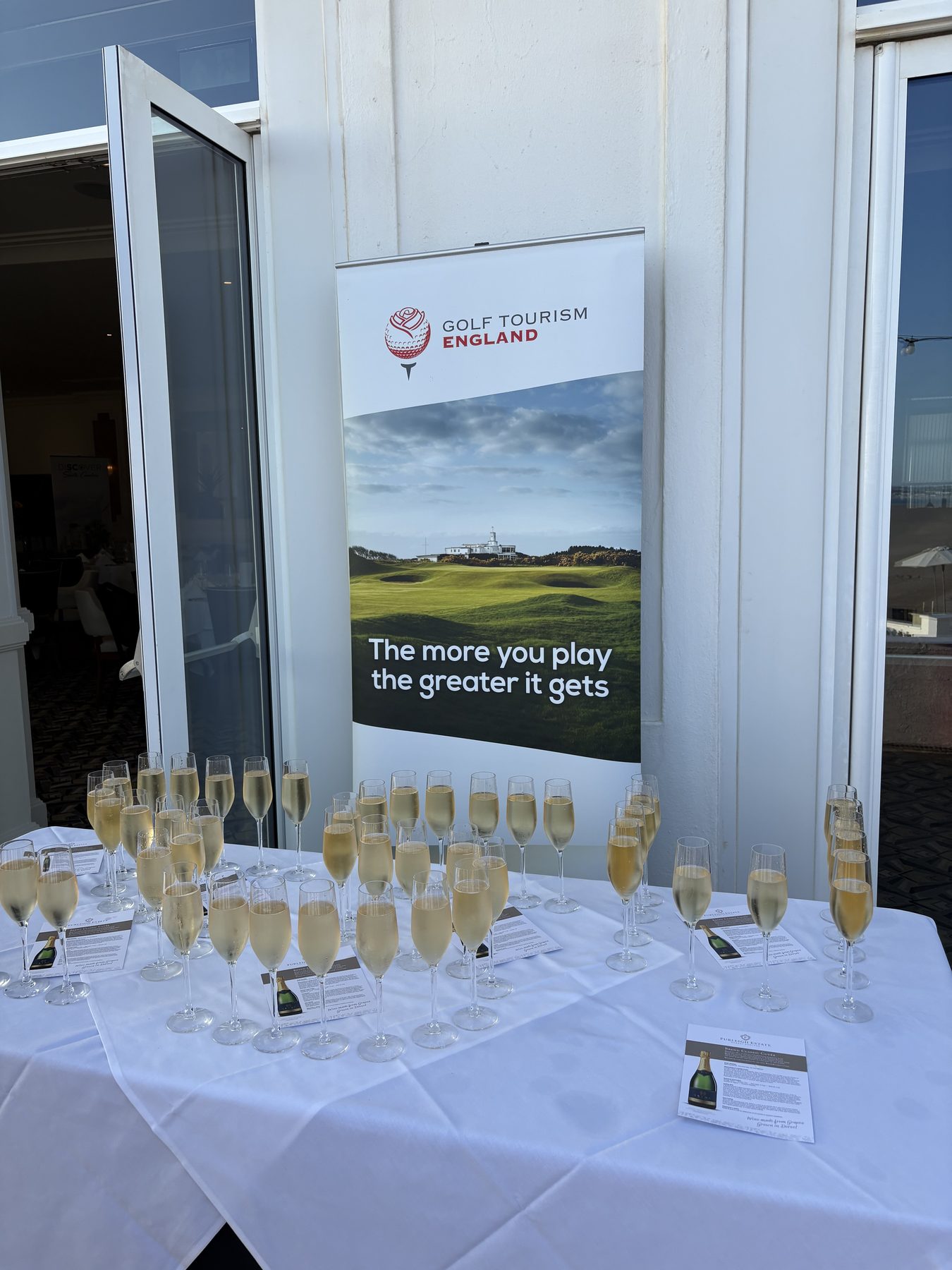 Welcome drinks and Golf Tourism England banner at the GTE Convention 2026