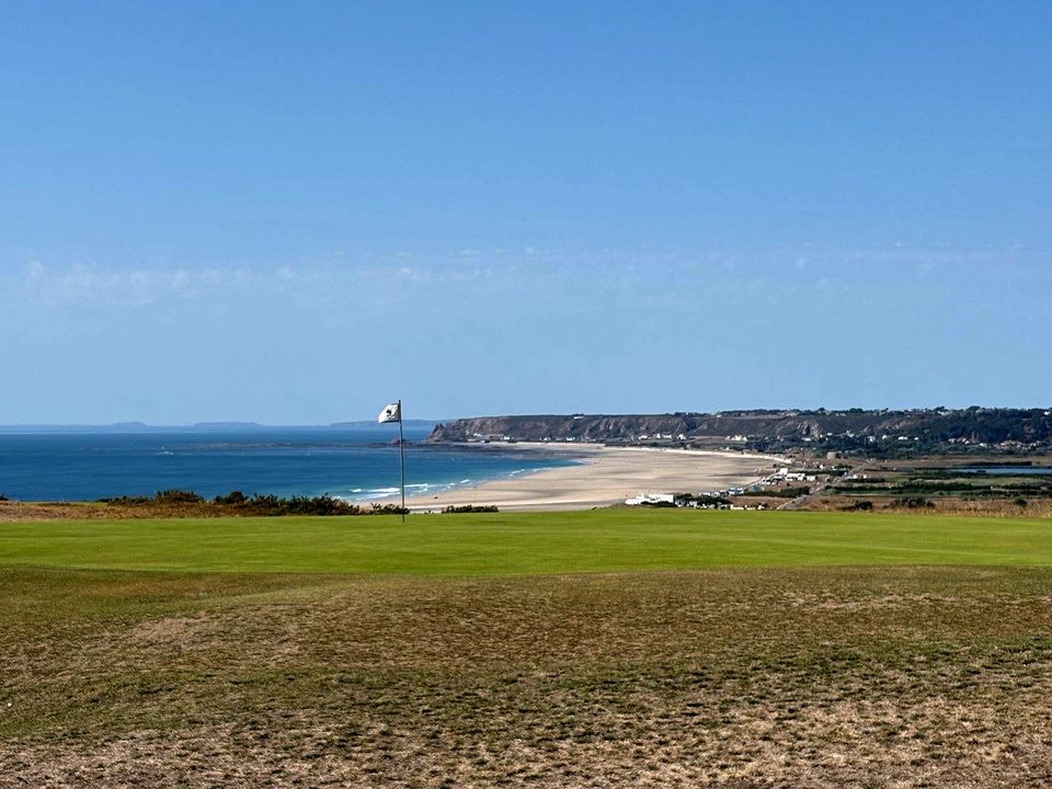 La Moye fairways looking down over St Aubin's Bay